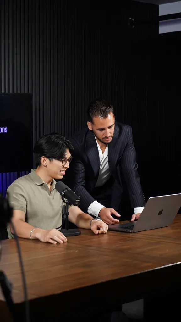 Sebastian working with a colleague in the studio